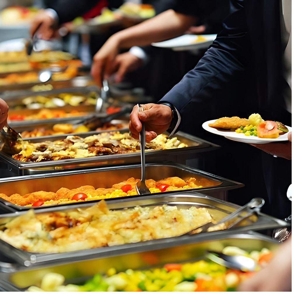 Guests being served at an FNB Caterers buffet in Dubai
