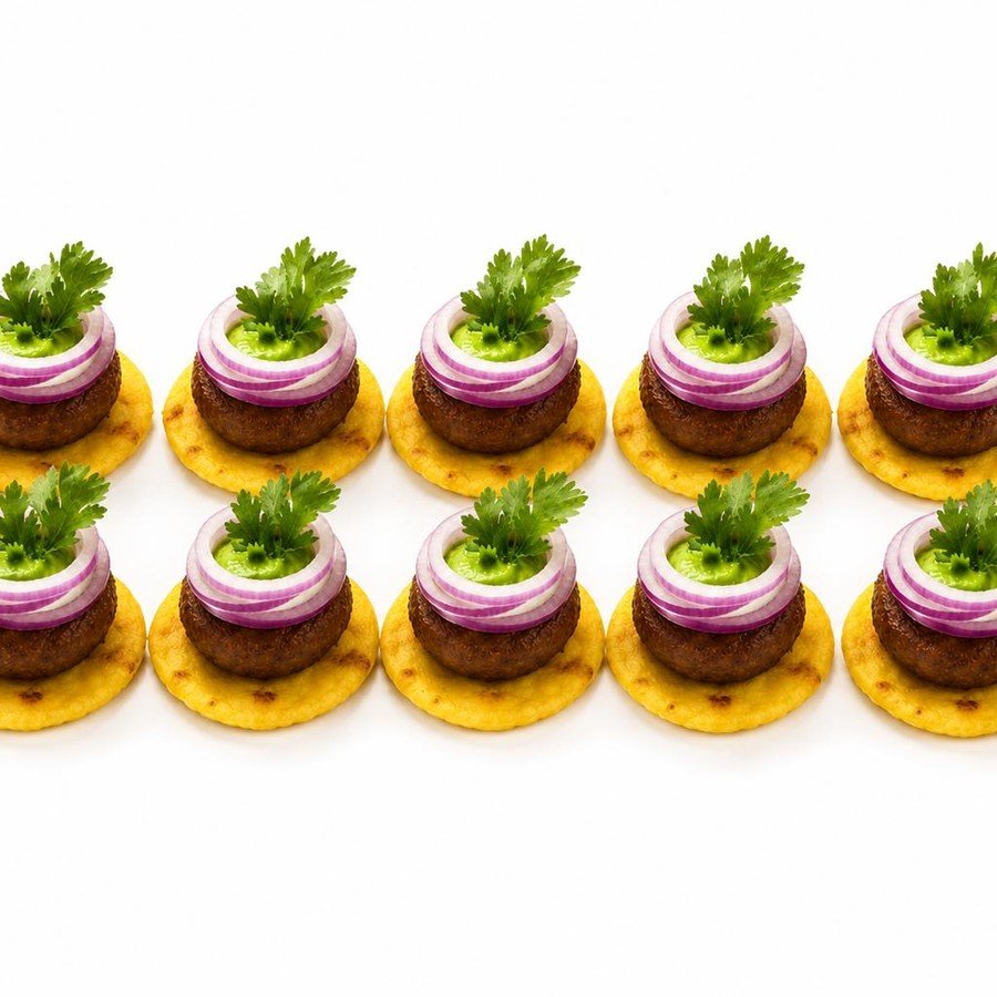 Galouti kebab canapé bites with pickled onion, part of an FNB Caterers tasting menu